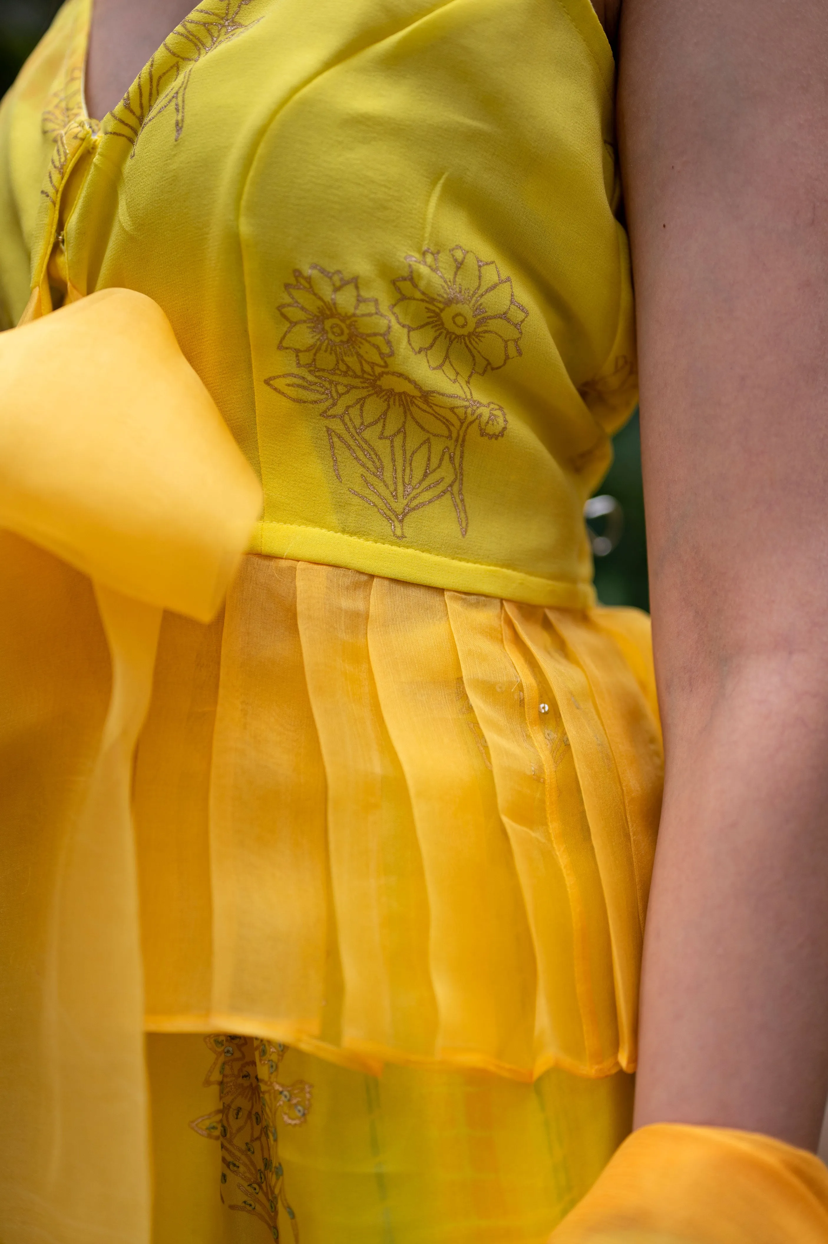 Frilled georgette top with hand block print sunflower and organza sash